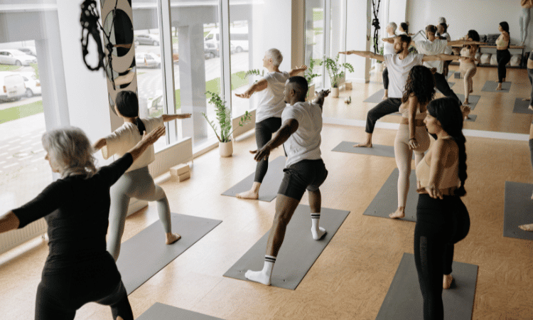 A group of yogis flow to a yoga playlist by black artists.