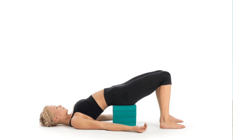 Bridge pose is a great yoga pose that can be done with a block. 
