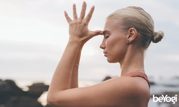 A yogi goes through her qigong taoist yoga asana.